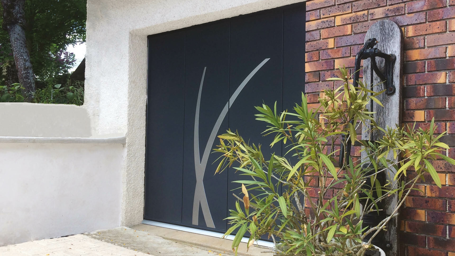 Porte de garage coulissante Linconyl motif brin d'herbe